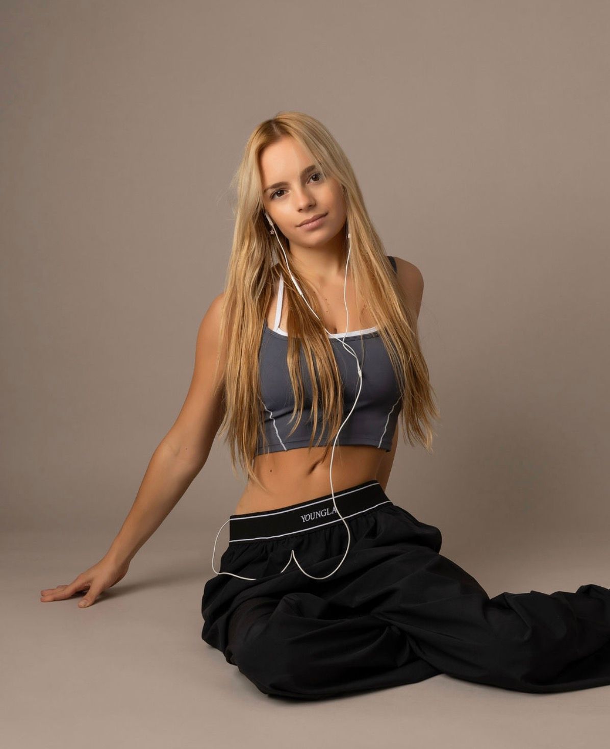 Girl sitting in the floor