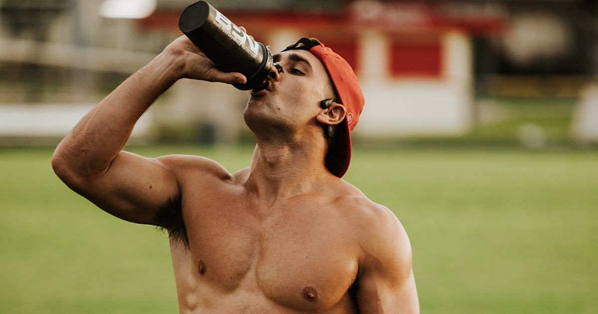Joey Miuccio drinking from a water bottle after a session
