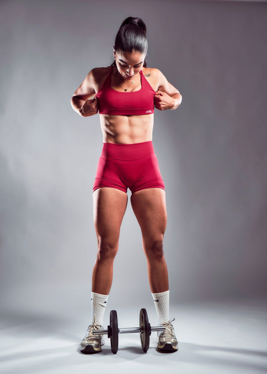 The coach is showing her muscle.