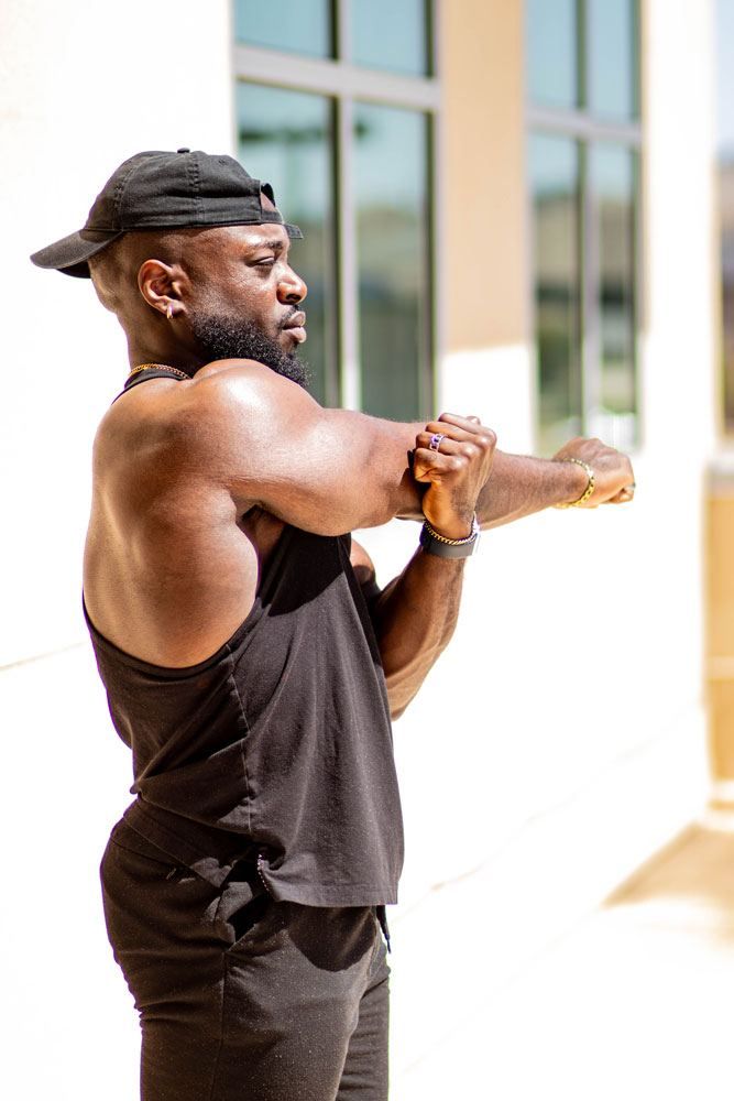 Joseph Oppong warming up outside
