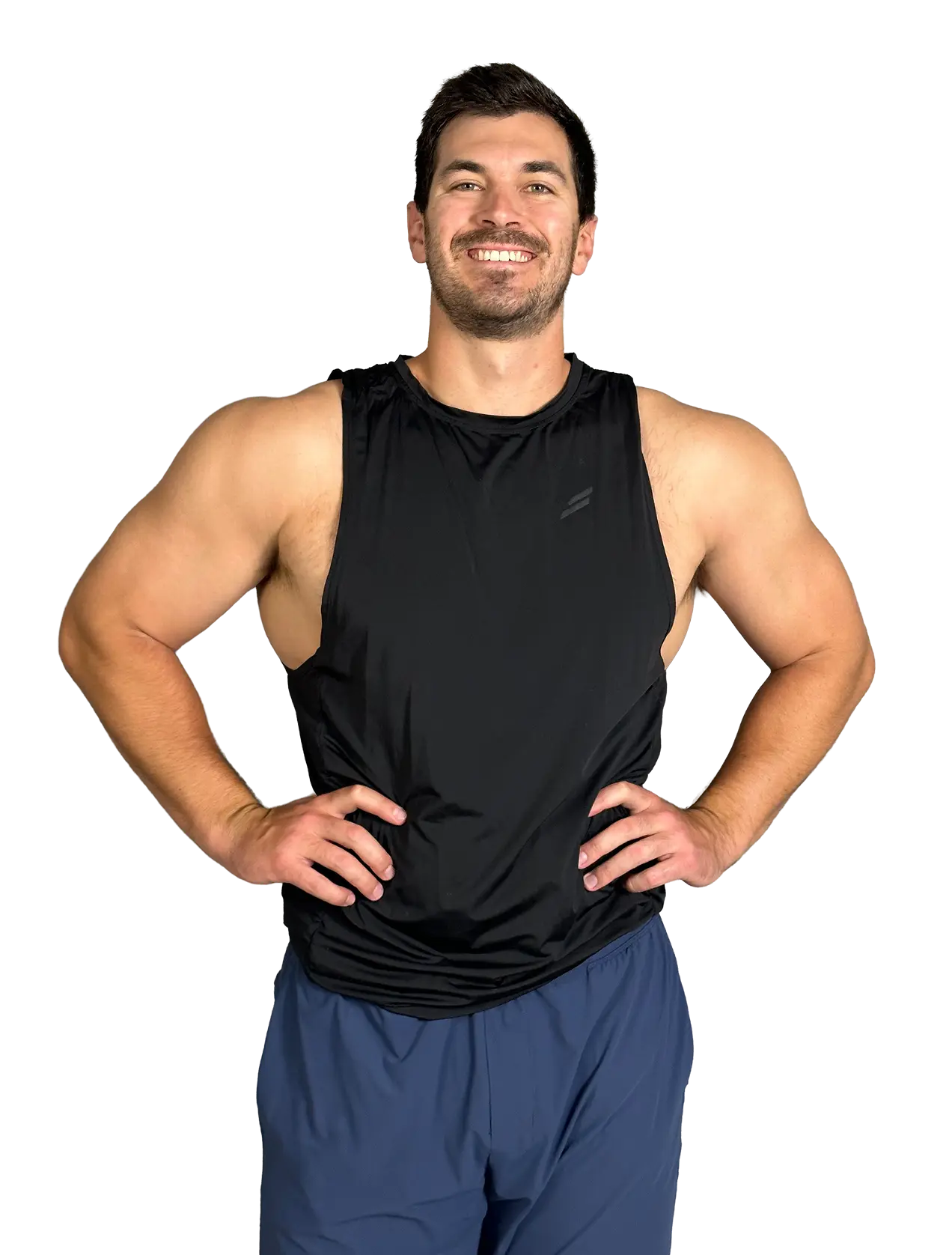 Austin Martin, online fitness coach for beginners, smiling with hands on hips